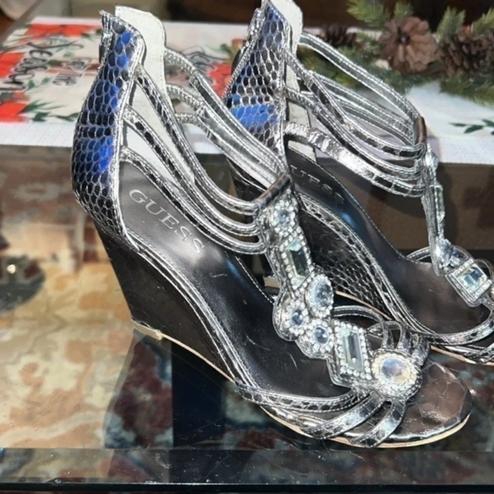 Guess heels about to 4inches, big rhinestones , bright and shiny